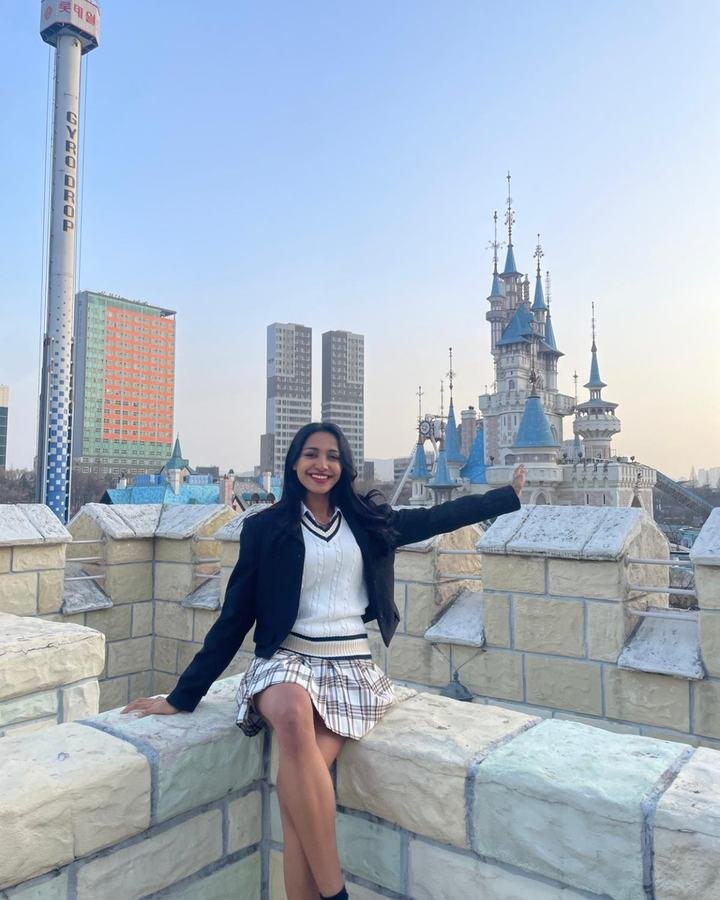 Ayeshma, the Showma In Korea teacher, smiling at a castle-themed park in Seoul